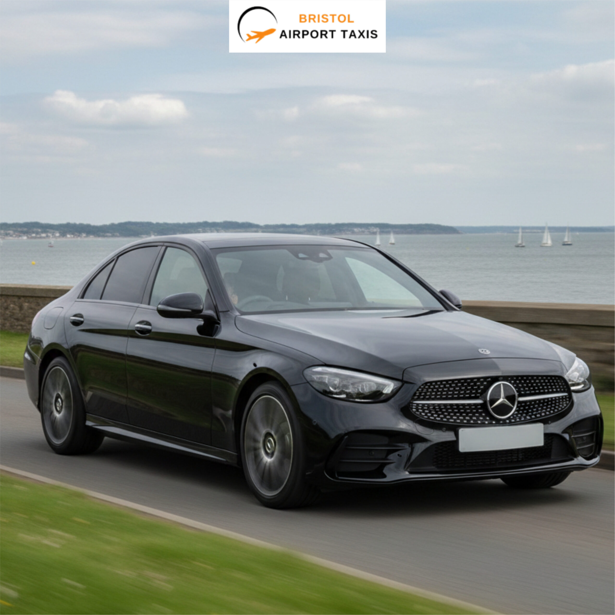 Luxury black Mercedes airport taxi by Bristol Airport Taxis on a historic Bristol street