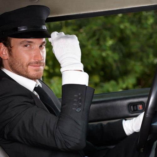 driver sitting on front seat of the car